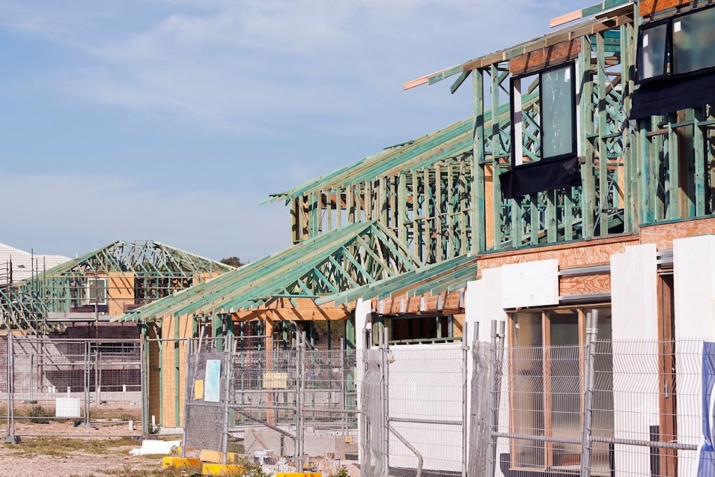 Melbourne residential development construction site with timber framing — funded through MortgageHQ development finance